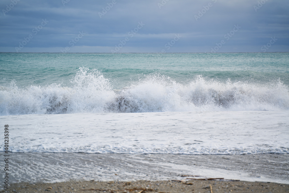 waves breaking wildly on a stormy day in Nerja, Andalucía