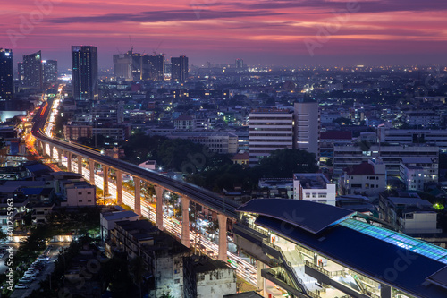 cityscape view of a building, sky train and twilight sky in Bangkok 