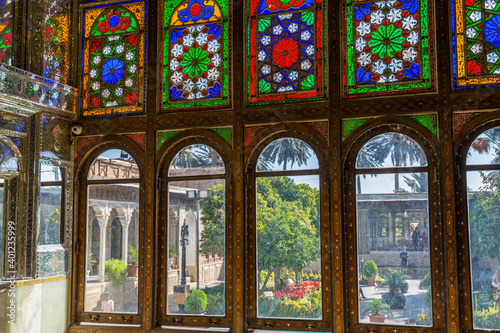 Colorful painted tiles on the window of Zinat-ol Molk House belonged to Qavam-ol Molk family, Medieval Persian mansion with preserved Qajar Era art