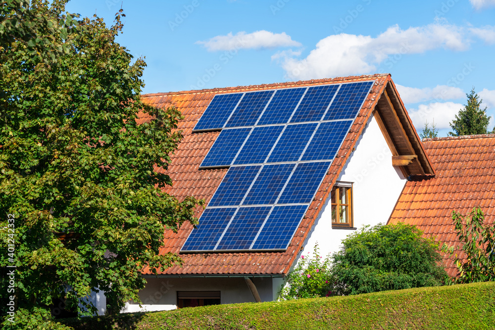 Generic house (modified by image editing) with a photovoltaic system