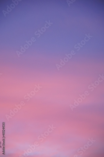 Abstract blurred pink purple and blue gradient colorful clouds and sky sunset on evening nature background.