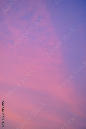 Abstract blurred pink purple and blue gradient colorful clouds and sky sunset on evening nature background. © BBbirdZ