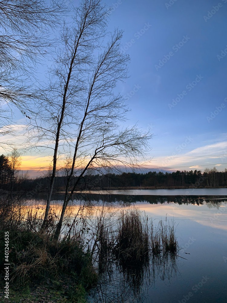 Winter sundown at ponds in Myszkow Poland.