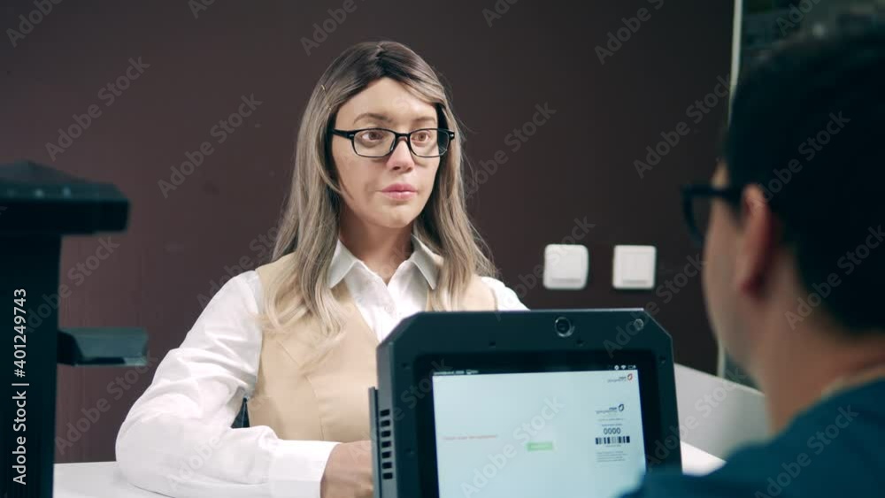 Female human-like cyborg is talking to a man Female human-like cyborg is talking to a man