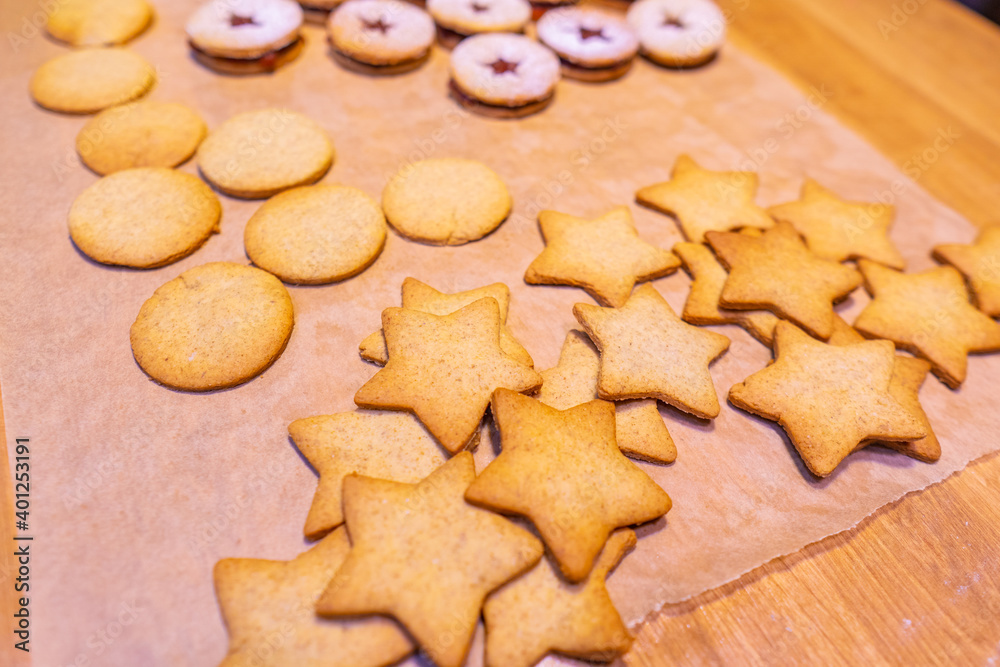 Freshly baked peanut butter cookies on cooling rack. Macro with extremely shallow dof. Selective focus limited to center of closest cookie. Freshly baked peanut butter cookies on cooling rack. Macro with extremely shallow dof. Selective focus limited to center of closest cookie.