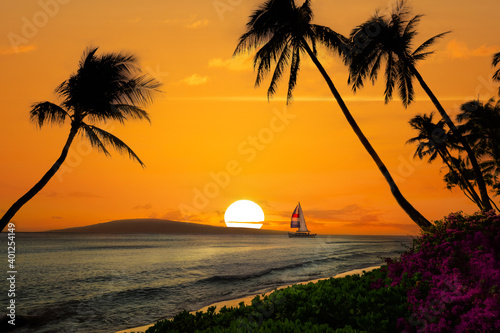 Hawaiian sunset with sailboat and mountains © jdross75