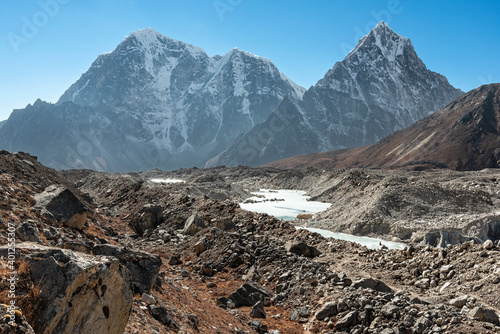 Taboche and Cholatse looming over the melting Khumbu glacier.
