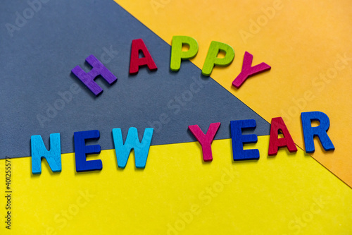 Happy new year font art colorful texting for greeting or celebrate card with colorful background, Sensitive Focus