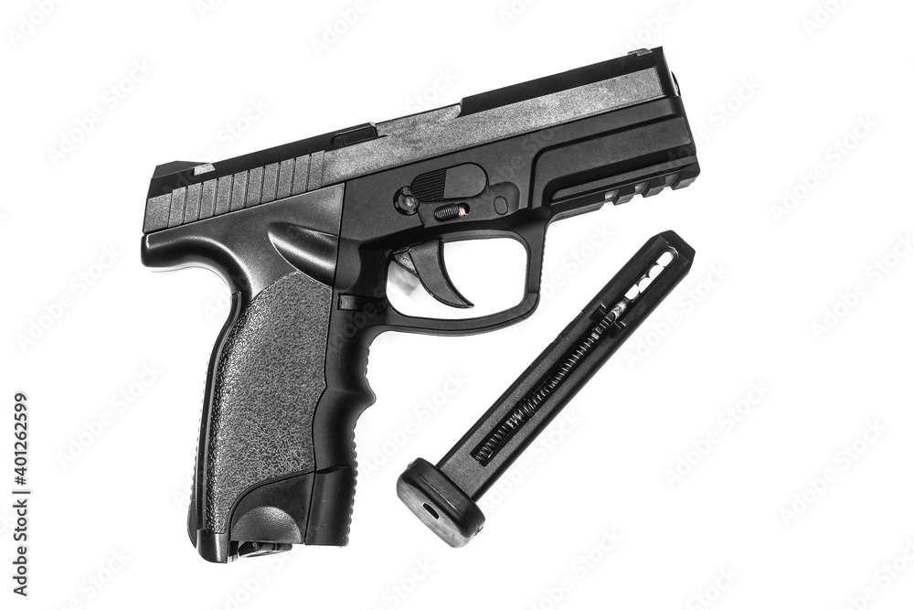 Black Airsoft gun and bullets magazine on white background Black Airsoft gun and bullets magazine on white background