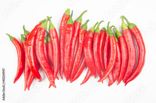 Red hot chili peppers on a white background. Vitamin vegetable food