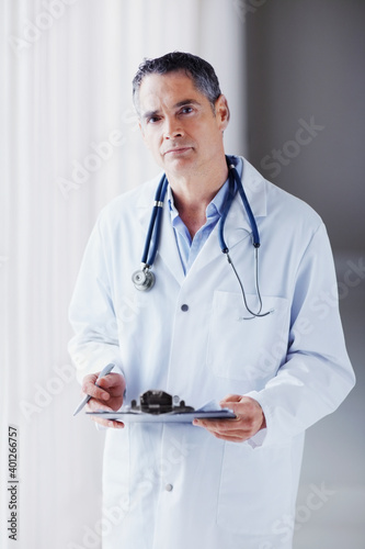 Doctor holding chart photo