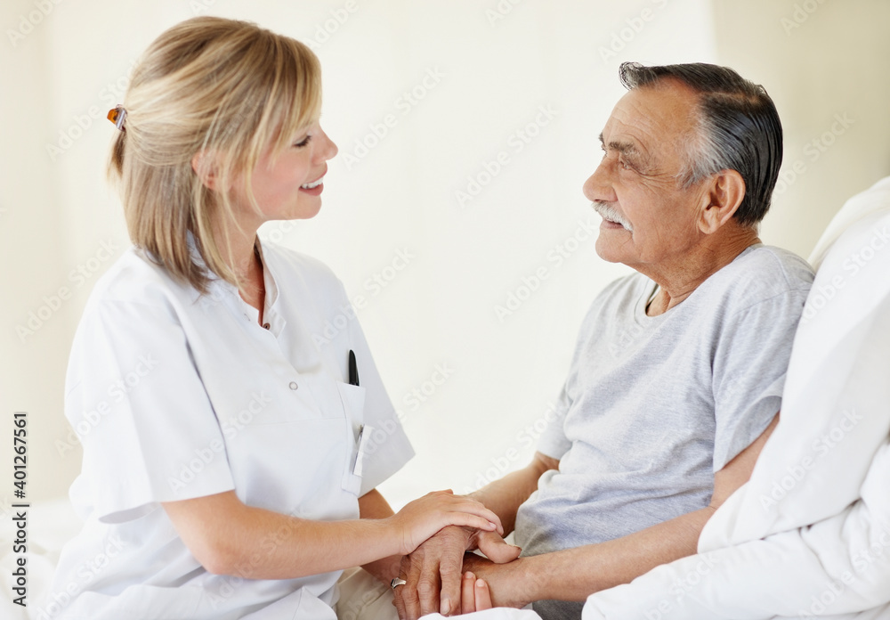 Nurse sitting with patient Nurse sitting with patient