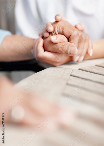 Two people holding hands photo