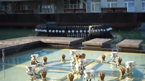 Non-working fountain in the city square during the day