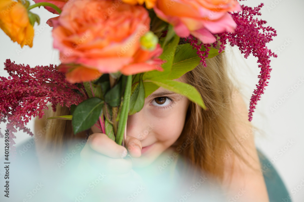 Girl (6-7) holding flower bouquet Girl (6-7) holding flower bouquet