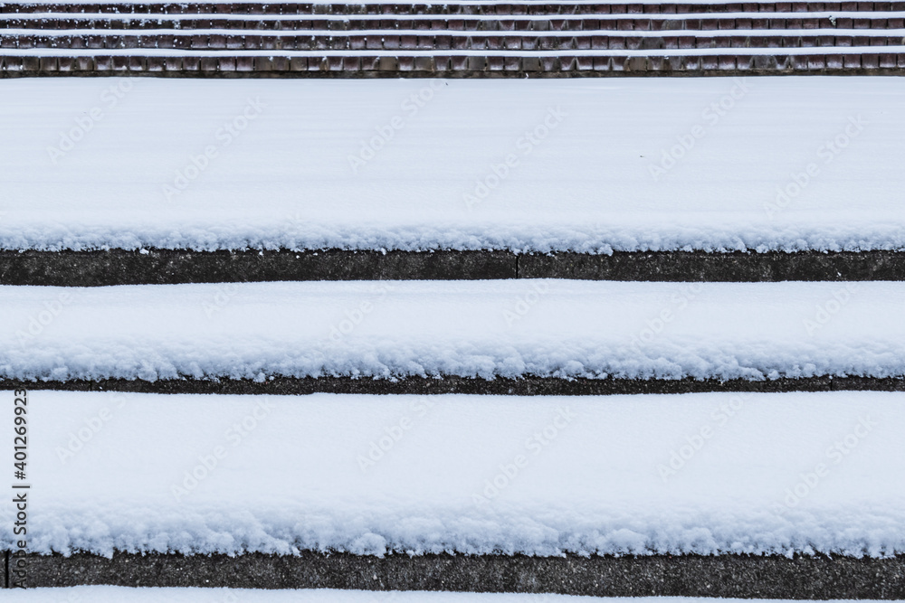 Stair steps with white snow are snowy Stair steps with white snow are snowy