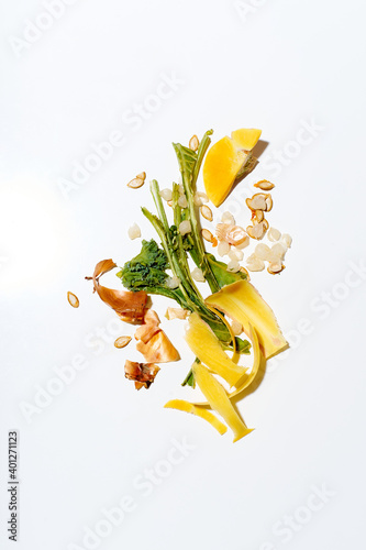 Vegetable peelings and rind on white background