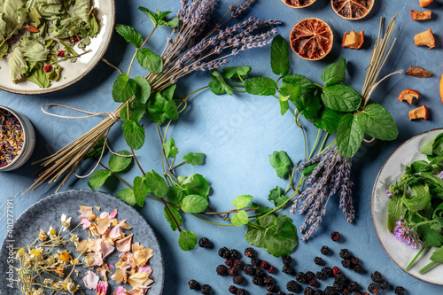 Herbal tea design template with copy space. An assortment of natural, organic, and healthy ingredients, forming a frame, overhead shot photo