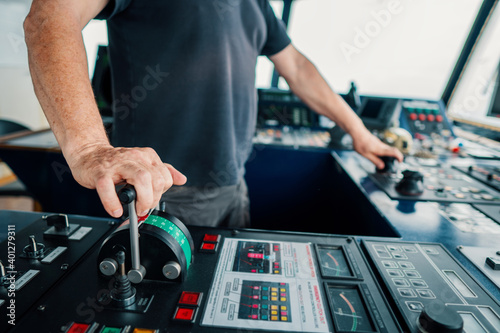 Konstfotografi Captain of deck Officer on bridge of vessel or ship during navigaton watch at sea