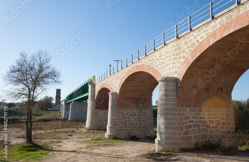 Old train bridge over the Tietar river as it passes through La Bazagona, still in use