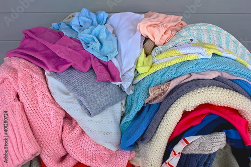 Heap of women's sweaters for the winter and autumn seasons.