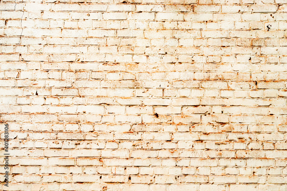 Obraz premium Texture of a brick wall with cracks and scratches which can be used as a background
