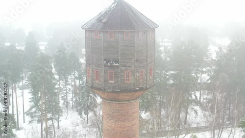 view of the old water tower standing by the road