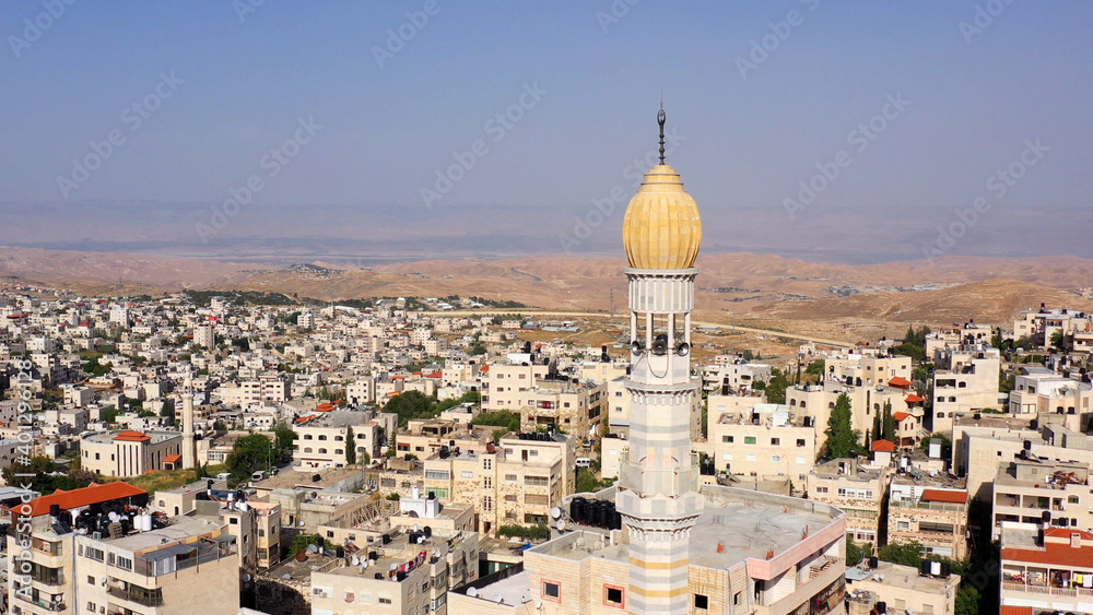 Mosque Tower minaret With Speakers in Jerusalem
Beautiful Drone footage with Jordan desert mountain, Shuafat, Jeusalem 
