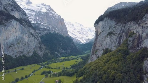 Scenery view of the Valley of Lauterbrunnen in Switzerland witz snowy mountains.