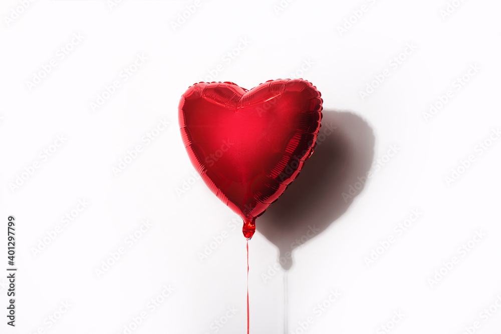 red air balloon in the form of a heart on a white background red air balloon in the form of a heart on a white background