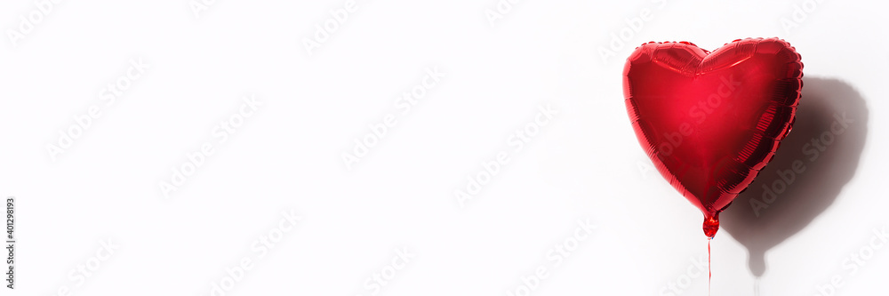 red air balloon in the form of a heart on a white background. Banner. red air balloon in the form of a heart on a white background. Banner.