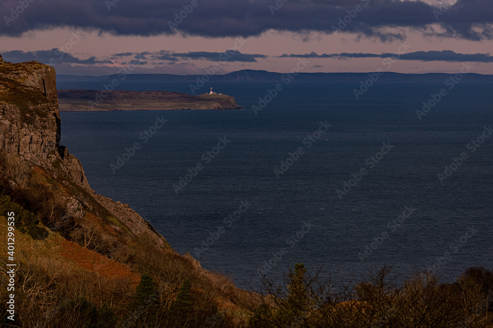 Fairhead, Rathlin Island East Lighthouse and The Isle of Islay in Scotland from Murlough Bay, Causeway coastal route, Causeway coast and Glens, County Antrim, Northern Ireland