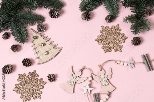 New Year s composition. Christmas gifts  pine cones  fir branches and toys. Flat lay  top view  copy space