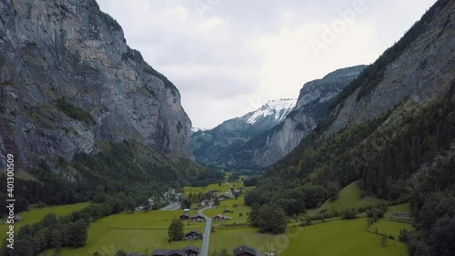 Valley of Lauterbrunnen in Switzerland with snowy mountains in autumn.
