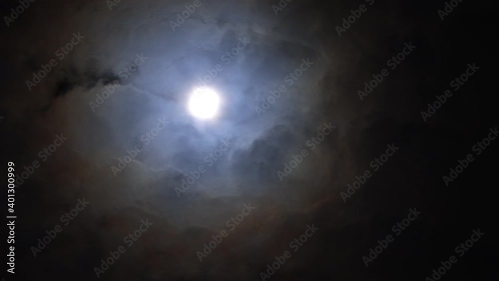 Full Moon Moving Behind Flying Clouds. 4K Timelapse footage. Full Moon Moving Behind Flying Clouds. 4K Timelapse footage.