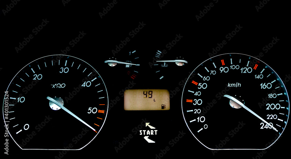 Fototapeta premium Car dashboard on a black surface. Car instrumental panel with warning signs and warnings. Car speedometer
