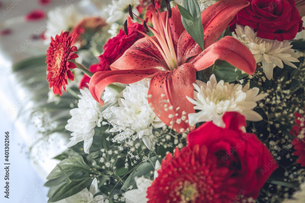 Wedding flowers decoration. Wedding decoration with bridal bouquet closeup. Decoration made of roses, peonies and decorative plants, close-up, selective focus, objects. Wedding flowers decoration. Wedding decoration with bridal bouquet closeup. Decoration made of roses, peonies and decorative plants, close-up, selective focus, objects.