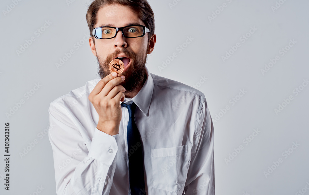 Bitcoin cryptocurrency business man in a suit gray background Copy Space Bitcoin cryptocurrency business man in a suit gray background Copy Space
