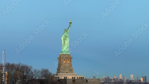 Statue of Liberty at dusk with the lit torch, USA