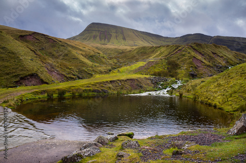 Small lake and Fan Brycheiniog, the Black Mountain, Brecon Beacons National Park, Wales, UK photo