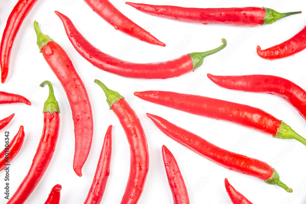Red hot chili peppers on a white background. Vitamin vegetable food