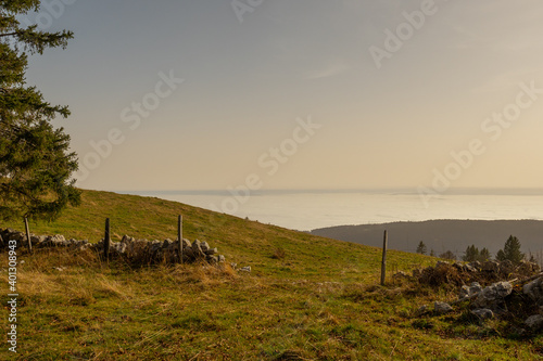 View from Swiss Jura chain over the sea of fog of Lake Biel on an autumn day