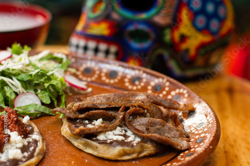 Close up of Traditional Mexican food meat sopes 