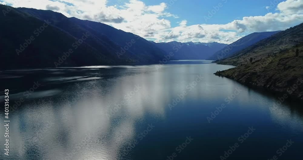 Fly drone over Lake Chelan Washington. Flying from the North to South side of the lake. Fly drone over Lake Chelan Washington. Flying from the North to South side of the lake.