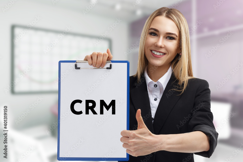 Business, technology, internet and network concept. Young businessman thinks over the steps for successful growth: CRM Business, technology, internet and network concept. Young businessman thinks over the steps for successful growth: CRM
