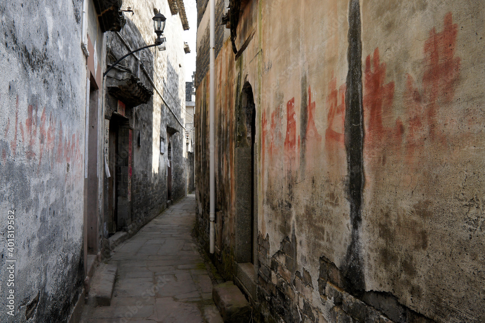 A narrow alley snakes between Ming and Qing Dynasty houses in the village of Tangyue, Anhui Province, China.