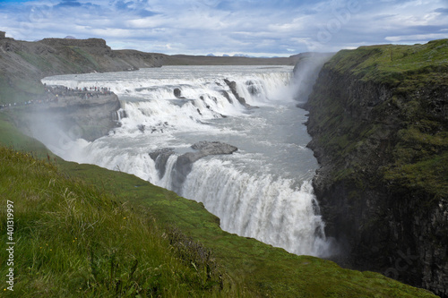 Visitors follow the Trail of Sigridur to an overlook above Gullfoss  Golden Falls  on the Hvita River in Iceland.