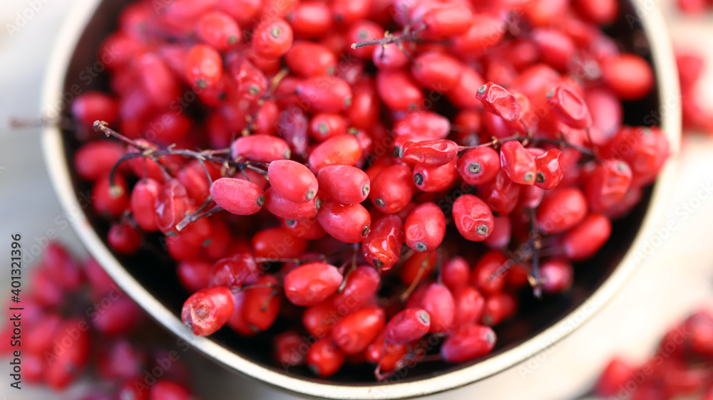 Fresh barberry in a bowl. Red berries of barberry. Fresh barberry in a bowl. Red berries of barberry.