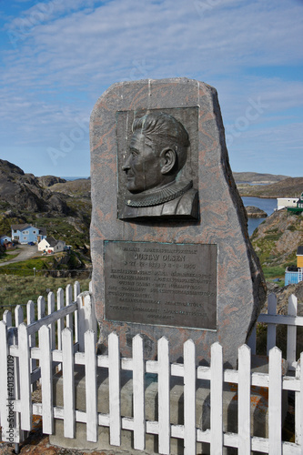 A monument to missionary Gustav Olsen stands near the Greenland Church in Sisimiut, Greenland's second largest town. photo