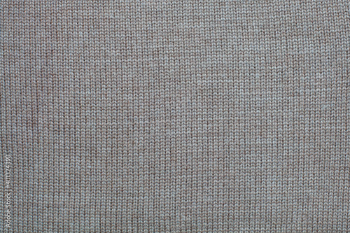 Light brown wool knitted canvas, hand knit, plain knitting, horizontal photo